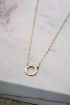 "\"What goes around, comes around. A minimal karma circle necklace made with love! Just a simple way to share happy thoughts. Go on and share yours. Who knows... Anything is possible!\" --Fairy Goldcharm ♥♥ CUSTOMIZATION ---> Available in yellow, white, and rose gold. ♥♥ DETAILS The circle's diameter is 0.9cm (approx. 0.35in). ♥♥ CHAIN ---> The karma circle is presented with a gold chain. ---> The whole necklace is 40cm long (approx. 16in). ---> The chain used is 0.8mm thick (approx. Minimalist Yellow Gold Open Circle Necklace, Minimalist 14k Gold Filled Round Necklace, Minimalist 14k Gold Open Circle Necklace, Minimalist Circle Necklace For Anniversary, Minimalist Yellow Gold Circle Necklace, Minimalist Circle Necklace For Everyday, Minimalist Everyday Circle Necklace, Everyday Rose Gold Circle Necklace, Dainty Open Circle Everyday Necklace