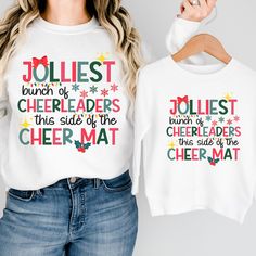 Get your squad ready for the holidays with our festive and fun Christmas Cheerleader Shirts! Perfect for cheerleaders and their squads, these matching Christmas shirts are designed to bring extra cheer to your competition day or holiday gatherings. With a fun graphic that celebrates the spirit of the season, these shirts are sure to make your whole team stand out. ❤  Available in adult, youth, and baby sizes, our shirts make it easy for everyone to join in the fun--whether you're at a holiday event, cheerleading competition, or just celebrating with your squad. The shirts are all white, offering a clean and classic look, while the graphic adds a festive touch perfect for Christmas. Why You'll Love It: 👉 Perfect for Cheer Squads: Matching Christmas shirts to keep your team looking festive Cheerleading Christmas Shirts, Christmas Cheer Squad Shirts, Cheerleader Shirts, Cheerleading Competition, Cheerleading Shirts, Cheer Shirt, Squad Outfits, Cheerleading Gifts, Matching Christmas Shirts