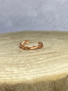 100% Copper ring. Twisted/Braided copper detail. Slightly adjustable. All handmade. Copper has amazing benefits for our overall health and functioning in life. Copper is helpful for balance, communication, and synchronicity. Copper is a great conductor of energy and is useful for all types of spiritual purposes. Many use Copper to balance the Chakras and Meridians. Check out my other listings for other bracelets, including copper, aluminum and beaded: https://www.etsy.com/shop/JGZDesigns?ref=sho Double Braid, Copper Ring, The Chakras, Copper Rings, Twist Braids, Handmade Copper, Minimalist Rings, Overall Health, Adjustable Ring