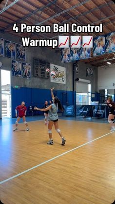 four people are playing volleyball in an indoor court with the words, 4 person ball control warmup