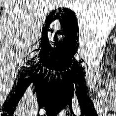 a black and white photo of a woman in the rain