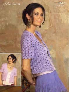 a woman wearing a purple crochet top and skirt in front of a wall