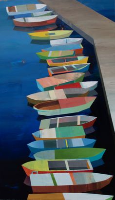 several row boats are lined up on the water's edge, and one is painted multicolored