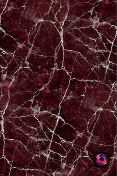 a red marble textured wallpaper with white streaks