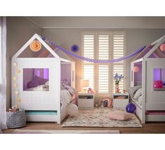 a bedroom with two beds and purple lights on the windowsills is decorated in pastel colors