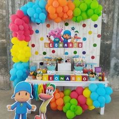 a birthday party with balloons and decorations