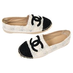 100% Authentic These white espadrilles have a slim midsole with multicolored tweed uppers. They feature a prominently stitched Chanel CC logo at the front in black and a black tweed toe cap. Very Good Condition- Light wear to Soles OQS530065 NM9.13.24 One of the most famous fashion and handbag designers of all time, Gabrielle Bonheur "Coco” Chanel opened her first millinery on Paris’s Rue Cambon in 1910. By 1920, Chanel had ventured into apparel, while the 1930s brought the first release of the Chanel handbag. The handbags had a classic silhouette with a thin shoulder chain, details that would become hallmarks for signature Chanel bag models like the Jumbo & Maxi Flaps, Grand Shopping Tote, and Boy Bag among other Chanel handbag creations 1920 Chanel, French Shoes, Chanel Espadrilles, Vintage Chanel Bag, White Espadrilles, Chanel White, Chanel Brand, Black Tweed, Pearl Leather