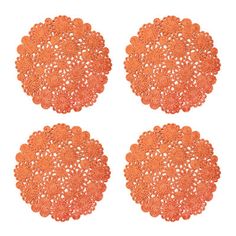 four orange doily on a white background