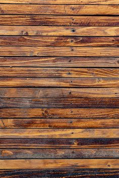 wood planks are brown and black in color