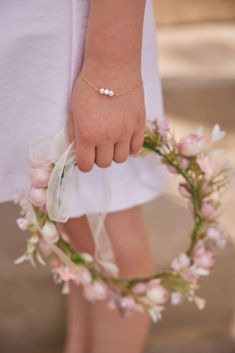 Little English x Hazen & Co's Triple Pearl Bracelet is the perfect dainty addition to your little girl's look. Delicate and precious, the Triple Pearl Bracelet is one she can wear for years to come! Freshwater pearls + 14k gold-filled chain 5.5 + 1/2 extender Made in Texas Elegant Pearl Bracelet For First Communion, Elegant Hypoallergenic Bracelet For First Communion, Elegant Pearl Bracelet With Pearl Charm For First Communion, Elegant Bracelet For First Communion, Adjustable Pearl Bracelet With Charm For First Communion, Adjustable Pearl Charm Bracelet For First Communion, Elegant White Bracelets, Dainty Personalized Pearl Bracelet, Dainty Hypoallergenic Jewelry For First Communion