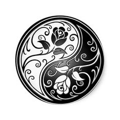 a yin yang symbol is shown in black and white with swirls on the side