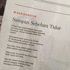 a close up of a paper with an article in the language of sarpan sebelum tidur