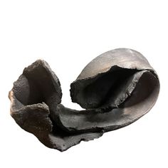 a piece of metal that has been taken out of the ground and is broken in half