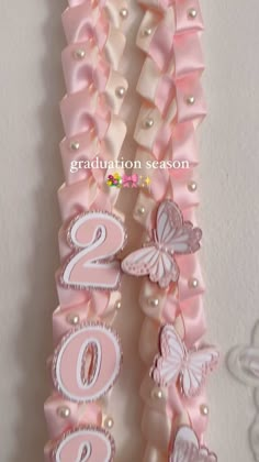 Spring grads this is for yall!! These beautiful leis are spring inspired with a coquette touch!!✨🎀 To place your order, click the link in… | Instagram Pink Senior Crowns, Coquette Graduation Cap, Pink Graduation Cap, Cap Decoration Graduation, Graduation Leis Diy Ribbons, Senior 25, Grad Leis, Senior Year Diy, Graduation Leis Diy