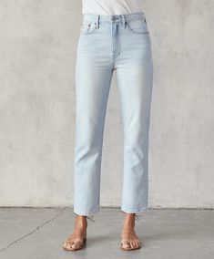 Our modern take on the timeless, vintage-inspired straight leg with the same iconic high-rise and curve-hugging fit through the hip. Cut from rigid 12.5 oz organic cotton denim with an unbelievable wash for a lived-in feel the moment you slide ‘em on. The best-fitting, straight-leg blue jeans you can find that feel as good as vintage without all the flea market haggling. Size down for a higher, closer fit. Polo Sweatshirt, Denim Pant, Flea Market, Pale Blue, Bottoms Pants, Beach Outfit, Straight Jeans, Denim Women, Blue Jeans