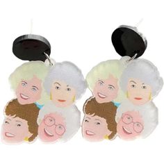 the golden girls earrings are made out of plastic and have cartoon faces on them,