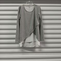 Green Envelope Women's Tunic Top Size Small Gray White Pullover Lagenlook Blouse. Scoop Neck. Layered Look. Long Sleeve. Tunic Length. Pullover Relaxed Fit. New Without Tags. Never Worn. Bust Pit To Pit 18". Length Is Approximately 26". Sleeve 25". B141 9-1-24 Gray Tops For Layering, Green Envelope, White Pullover, Green Envelopes, Women Tunic Tops, Tunic Length, Long Sleeve Tunic, Layered Look, Tunic Top