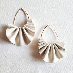 Handmade pleated leather high quality earrings are Lightweight and easy to wear in your choice of colors. Handmade by Bisjoux Tribal african modern inspiration. arrives in logo drawstring protective pouch Handmade Beige Hoop Earrings Elegant, Handmade Beige Elegant Hoop Earrings, Handmade Elegant Beige Hoop Earrings, Elegant Handmade Beige Hoop Earrings, Jewelry Hoops, Leather Jewelry Making, Leather Jewellery, Pleats Please, Deer Skin