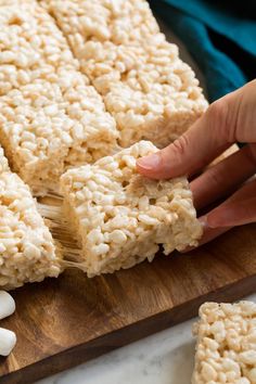 rice krispy treats on a cutting board with marshmallows