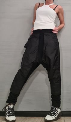 "Extravagant Pants, Harem Casual Pants, Urban Pants, Loose Pants, Cotton Pants, Gothic Pants, Outer pockets, New collection ❤️ Extravagant designs and high quality fabrics! ❤️ Materials & Care Cotton, Polyester Hand wash at low temperatures. Do not machine dry. Do not iron. Do not dry clean! ❤️ Sizing We can make your piece from XS to 5XL! Everything in the shop can be also made according to your measures free of charge! ❤️ Shipping ✈ Ready to ship The time I need to prepare an order for shippin