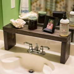 a bathroom sink with personal care items on it