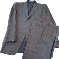 Three Button Gray Pinstripe Suit. Previously Owned. Excellent Condition 50r European Size. 40r Usa Size. Pants Are 32 Waist And 30 Long Formal Pinstripe Notch Lapel Sets, Elegant Striped Formal Sets, Classic Pinstripe Business Sets, Striped Business Sets, Classic Striped Formal Sets, Grey Pinstripe Suit, Pinstripe Suit, Gray Suit, Ermenegildo Zegna