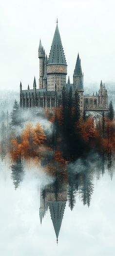 a castle is shown in the middle of a foggy landscape with trees and water