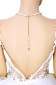 This bridal necklace and earrings set featuring round platinum plated cubic zirconias, Swarovski pearls, Rhinestone spacer, 19mm Zirconia and Rhinestone. Unique teardrop style pendant which has a delicate look. Finished off with Lobster clasp and Swarovski Pearl backdrop. Finish: Silver platinum or Rose gold plated components Material: AAA Zirconia, Swarovski Pearl, Rhinestone spacer, Lobster clasp. Length of Necklace: 17.5 inches Weight of Necklace: 35g We provided two backdrops for you to choo Adjustable Rose Gold Pearl Drop Jewelry, Wedding Rose Gold Dangle Necklaces, Rose Gold Pearl Drop Jewelry For Weddings, Pearl Backdrop, Bridal Backdrop Necklace, Backdrop Necklace, Bridesmaid Gifts Earrings, Backdrops Necklace, Pearl Rose