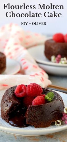 chocolate mousse cake with raspberries on top and the title overlay reads flourless molten chocolate cake