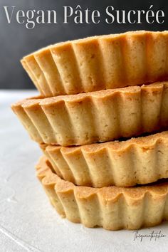 three vegan pies stacked on top of each other with the words vegan pate sucre written above them