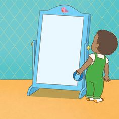 a child standing in front of a mirror