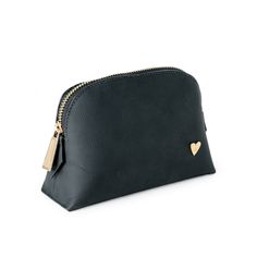 Our cosmetic bag is perfect for carrying your makeup and skincare organized. They are designed to fit perfectly in your purse or your travel bag! Features El portacosméticos no incluye los productos de la imagen. Genuine Leather Signature Heart Interior pocket Designed to stand in their own 4.5" H, 6.5" W, 2" D Black Rectangular Cosmetic Bag For Daily Use, Modern Rectangular Cosmetic Bag For On-the-go, Versatile Black Cosmetic Bag, Black Cosmetic Bag With Zipper For On-the-go, Black Rectangular Cosmetic Bag For Everyday Use, Black Rectangular Cosmetic Bag With Zipper, Black Zipper Pouch Cosmetic Bag For On-the-go, Black Clutch Cosmetic Bag For Travel, Everyday Clutch Cosmetic Bag With Zipper