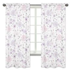 an open window with white curtains and pink flowers on the curtain rod, in front of a