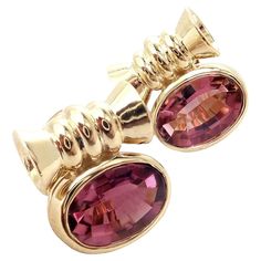 18k Yellow Gold Pink Tourmaline Earrings by Bulgari. With 2x round brilliant cut intense pink tourmalines total weight approximately 2.60ctw Each tourmaline is 12mm x 9mm x 2mm These earrings are made for pierced ears. Details: Measurements: 14mm x 17.5mm Weight: 21.5 grams Stamped Hallmarks: Bulgari 750 Made in Italy *Free Shipping within the United States* YOUR PRICE: $8,500 Ti799onoe Vintage Bulgari, Bvlgari Jewelry, Multicolor Jewelry, Vintage Designer Jewelry, Tourmaline Earrings, Zircon Jewelry, Authentic Jewelry, Antique Earrings, Yellow Gold Earring