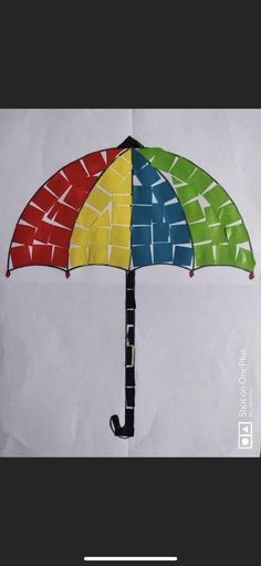 an umbrella made out of colored paper on top of a piece of paper with the words, how do you use it?