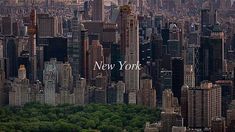 an aerial view of a large city with lots of tall buildings in the foreground