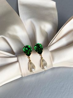 Elegant teardrop earrings featuring dark moss green tops paired with ivory crystal baroque dangles. Made with Premium Quality European Crystal. Available in gold, rose gold or silver finish. Post back.  - Measurements :    1 5/8" long from the top to the bottom of the earring    1/2" wide * RETURN POLICY - We do not accept returns for a refund as all of out items     are made to order. But please contact us if you are     having an issue with your order. - We do accept exchanges. You can exchang Green Teardrop Pearl Earrings For Wedding, Green Drop Pearl Earrings For Wedding, Green Pearl Drop Jewelry, Green Teardrop Jewelry With Pearl Drop, Green Teardrop Pearl Drop Jewelry, Green Elegant Pearl Drop Earrings, Formal Green Pearl Drop Earrings, Elegant Green Pearl Drop Earrings, Elegant Green Drop Pearl Earrings