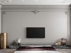 a large flat screen tv mounted to the side of a wall next to a bed