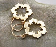 A beautiful flower shape hoop earrings  Lovely and light ,  fits any occasion day or night and any outfit. 24K gold plated  earrings with goldfilied ear wire.  Casual comfortable and easy to wear Flower size ~0.8" (2 cm) Total earring langth ~1.37" (3.5 cm) These earrings  is part of my "Flower Leaf" collection: https://www.etsy.com/listing/81551471/flower-earrings-big-gold-earrings https://www.etsy.com/listing/82264334/leaf-gold-earrings-leaf-earrings https://www.etsy.com/listing/155295439/flow Ornate Earrings, Gold Flower Earrings, Leaf Collection, Flower Hoop Earrings, Jewelry Design Inspiration, Earrings Flower, Flower Leaf, Big Earrings, Gold Flower