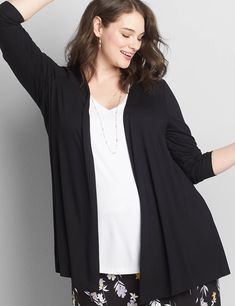 Available in Plus Size. This is the perfect layer for any time, any place. You'll love the soft knit, easy fit & flare silhouette and endless styling potential.Open front. Long sleeves. Jersey knit. Tunic length is perfect for added coverage with skinny jeans and leggings.FIT & FLARE: Nipped at the waist with a swing at the hips for a flattering hourglass effect.Item Number #375413Front Body Length From Shoulder: 36" (On Size 18)        Imported Plus Size Top Spring Stretch Cardigan For Everyday, Spring Everyday Stretch Cardigan, Versatile Stretch Cardigan For Layering, Classic Stretch Cardigan For Layering, Pants Skirts, Flare Top, Princess Inspired, Long Tunic, Plus Size Top