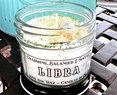 a jar filled with food sitting on top of a table