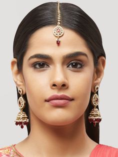 NAZRANAA JEWELS OFFERS A GREAT RANGE OF INDIAN JEWELRY FOR TODAY'S WOMAN WITH THE LATEST DESIGNS. THE BRAND IS COMMITTED TO PROVIDING ITS CUSTOMERS WITH THE HIGHEST QUALITY OF GOODS AND NEWEST DESIGNS. IT IS SUITED FOR A WOMAN WHO IS LOOKING TO STAY DATED WITH THE LATEST TRENDS. RADIANT ANTIQUE GOLD EARRINGS WITH MAANG TIKKA IS A PERFECT ACCESSORY FOR ANY NIGHT EVENT. IT IS SURE TO MAKE YOU STAND OUT IN A CROWDED ROOM. Traditional Indian Jewelry: Slight Color variations possible due to differenc Wedding Chandbalis With Tilla, Wedding Bridal Earrings With Tilla, Cutdana Jhumkas For Wedding, Reception Chandbalis With Tilla Detail, Kundan Necklace For Marriage, Festive Meenakari Bridal Earrings For Marriage, Hand Set Bollywood Style Bridal Sets, Bollywood Style Jhumkas For Wedding, Festive Bridal Meenakari Earrings For Marriage