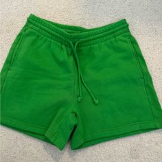 Never Worn. Perfect Condition 5” Inseam Green Trendy Shorts For Loungewear, Trendy Green Shorts For Loungewear, Green Casual Shorts For Loungewear, Green Comfortable Relaxed Fit Shorts, Green Relaxed Fit Comfortable Shorts, Comfortable Green Shorts With Pockets, Comfortable Green Shorts For Spring, Green Loungewear Bottoms With Short Leg, Green Cotton Drawstring Shorts