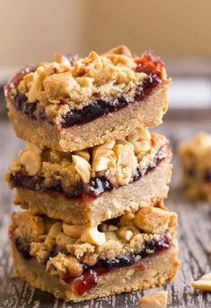 three peanut butter and jelly bars stacked on top of each other with the title above it