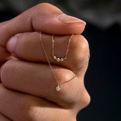 The Inez Triple Diamond Necklace is the perfect go-to for a layered necklace look. Elegant and modern, this design features three bright diamonds in delicate prong settings. Product Details: Material: 14K Solid Gold Chain Type: Cable Chain 0.7mm thickness Chain Length: 16 inches Extension Chain: 2 inches Stone Type: Diamond Diamond Weight: 0.057ct Simple Chain, Classy Jewelry, Fancy Jewellery, Jewelry Lookbook, Fancy Jewelry, Girly Jewelry, Layered Necklace, Simple Jewelry, Dream Jewelry