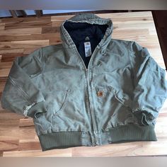 Vintage Carhartt Hooded Jacket Size Xxl Color Green Missing Zipper Pull. Zipper Still Working Without The Zipper Pull. Carhartt Hooded Jacket, Coats Vintage, Carhartt Jackets, Men Carhartt, Vintage Carhartt, Still Working, Hooded Jacket, Mens Jackets, Jackets & Coats