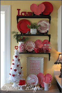 red and white valentine's day decorations on shelves