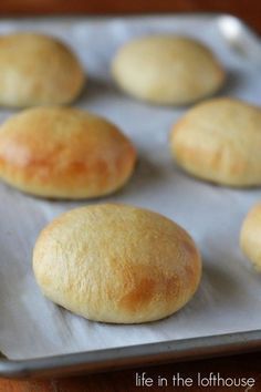 rolls on a baking sheet ready to be baked