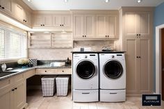 a washer and dryer in a large kitchen