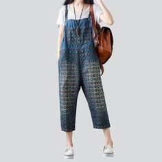 Bring the nostalgia home and show your unique fashion sense with this millennium-inspired sanded denim jumpsuit from our 2023 Spring-Summer Collection!Why You'll Fall In LoveThis vibrant jumpsuit is carefully crafted to create a established masterpiece. Its intricate painted print and sanded finish bring the Y2K era to life. with a loose silhouette that ensures comfort and ease of movement. Rich and radiant colors add a touch of edginess. while the delicate interplay of suspenders and buttons cl Denim Blue Bib Front Jumpsuit For Spring, Denim Blue Bib Front Jumpsuits And Rompers For Spring, Non-stretch Cotton Overalls, Summer Medium Wash Overalls, Blue Overall Jumpsuit With Pockets, Blue Bib Front Jumpsuit With Pockets, Casual Summer Overalls With Bib Front, Blue Overall Jumpsuits And Rompers With Pockets, Blue Relaxed Fit Overalls